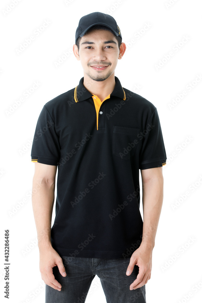 Confident Asian delivery man smiles and looks at camera with smile. Studio medium shot portrait of courier guy in black uniform on isolated white background. E-commerce business concept. Confident Asian delivery man smiles and looks at camera with smile. Studio medium shot portrait of courier guy in black uniform on isolated white background. E-commerce business concept.