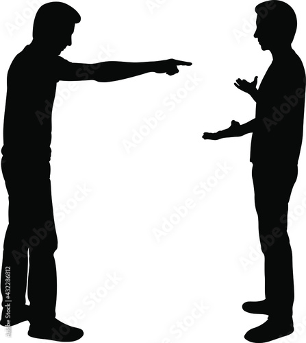 silhouette of a man accusing another man