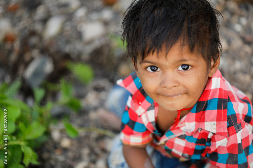 indian poor child playing at home indian poor child playing at home