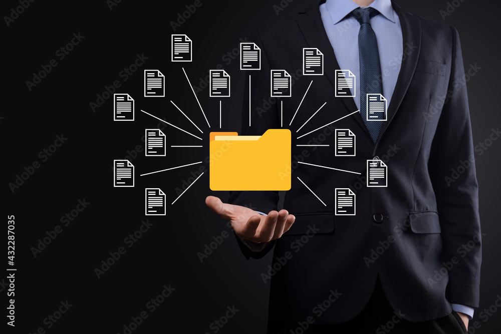 Document Management System (DMS).Businessman hold folder and document icon.Software for archiving, searching and managing corporate files and information.Internet Technology Concept.Digital security. Document Management System (DMS).Businessman hold folder and document icon.Software for archiving, searching and managing corporate files and information.Internet Technology Concept.Digital security.