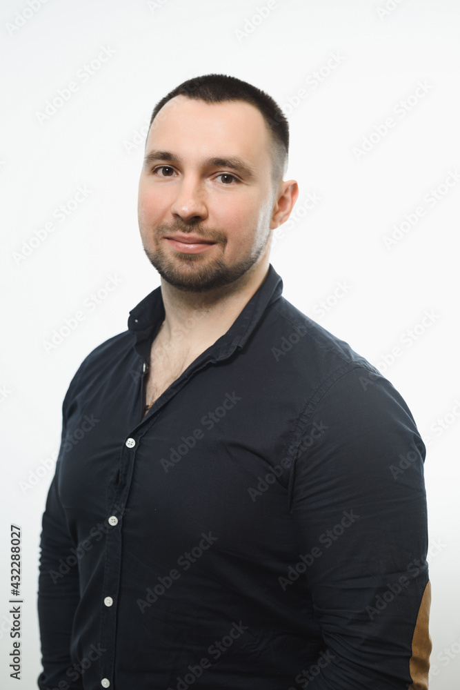 Portrait of young smiling caucasian man, wearing smart watch and casual denim shirt, isolated on white Portrait of young smiling caucasian man, wearing smart watch and casual denim shirt, isolated on white
