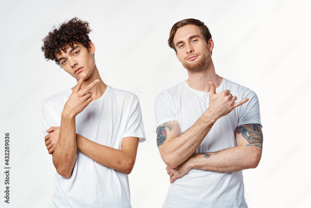 two guys in white t-shirts next to friendship communication emotions two guys in white t-shirts next to friendship communication emotions