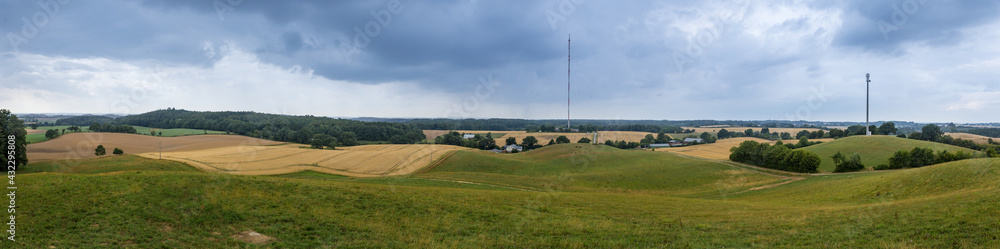 Panorama of hilly landscape with fields and meadows in the north of Germany, Europe