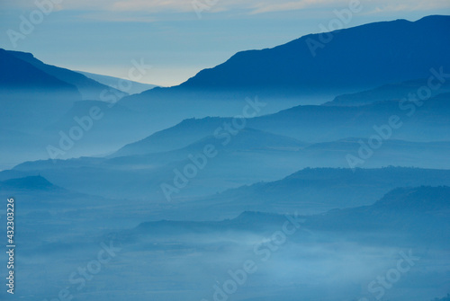 Blue hour mountains of the Sierra Monsec in the evening haze
