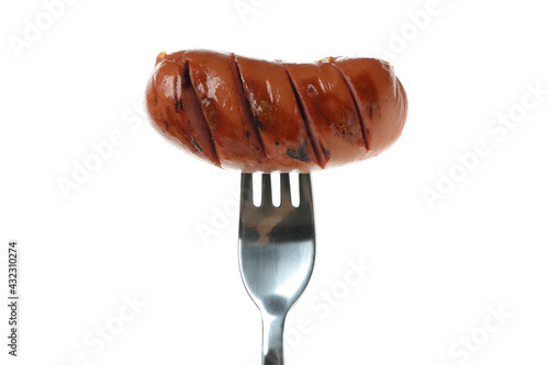 Fork with grilled sausage isolated on white background