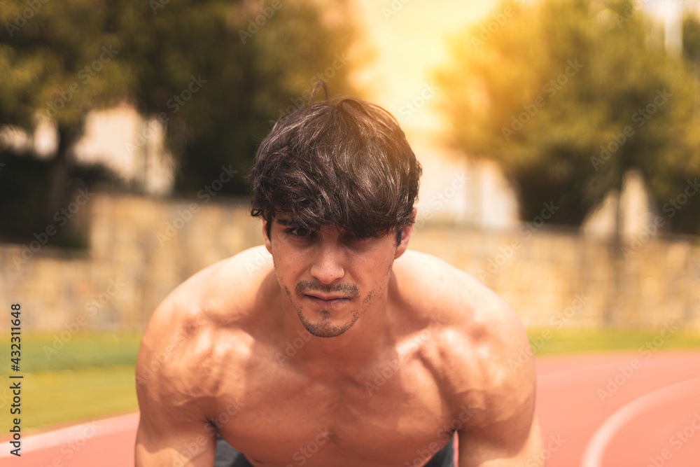 Obraz premium young athlete doing sport outdoors
