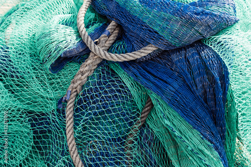close up of green and blue fishing net