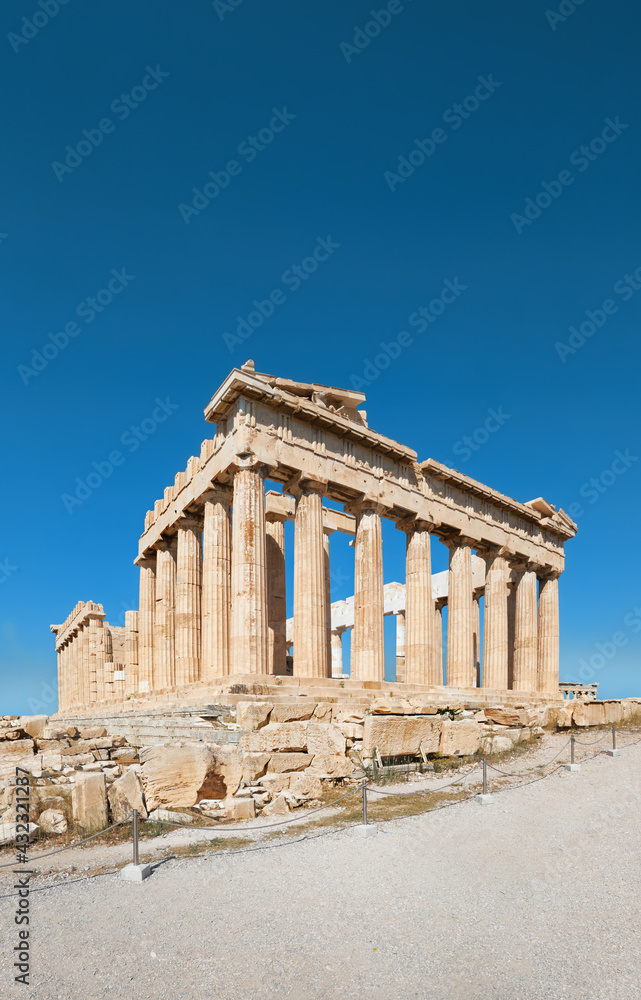 Parthenon temple on a bright day with blue sky. Panoramic image taken in Acropolis hill in Athens, Greece. Classical ancient Greek civilization landmark, famous place, vertical panoramic travel