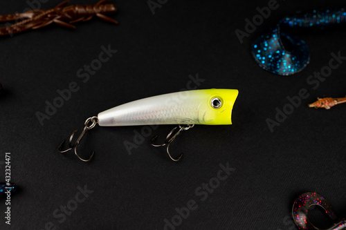 Bass fishing concept with lure baits. Flat lay style. Fishing tackle lures, copy space.
