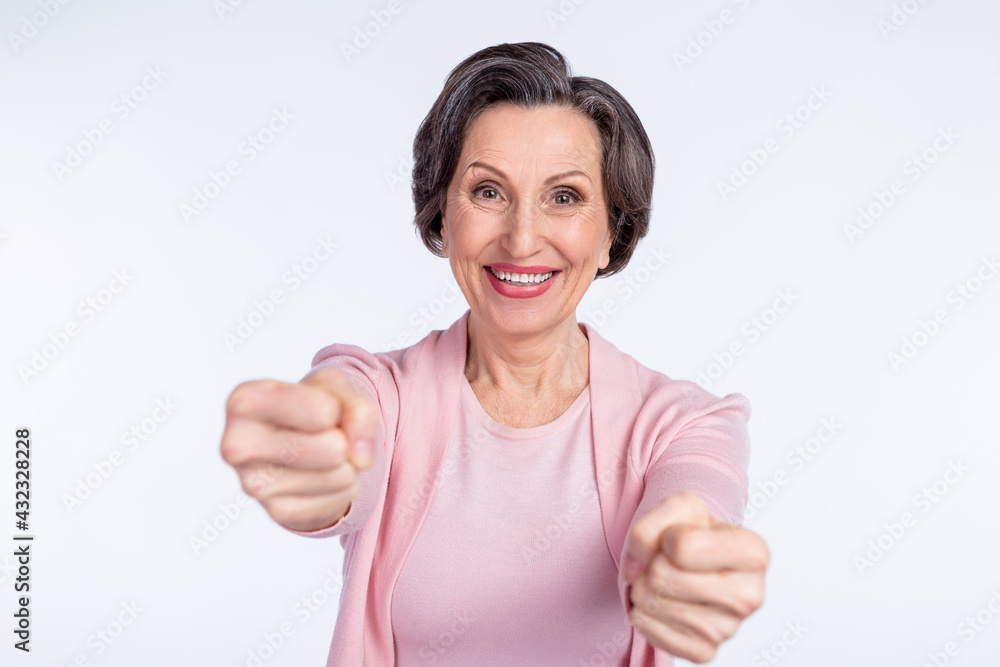Photo of cheerful funny mature lady wear pink clothes driving car smiling isolated white color background Photo of cheerful funny mature lady wear pink clothes driving car smiling isolated white color background
