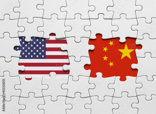 Jigsaw puzzle with the national flags of United States of America and China. International conflict and trade wars
