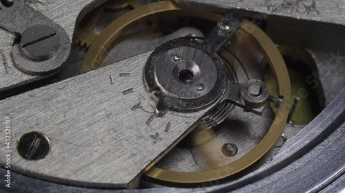 close-up of a working clock mechanism