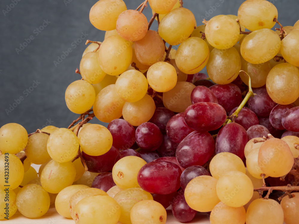 Still life of fresh fruit with pomegranate, grapes, pears and plums Still life of fresh fruit with pomegranate, grapes, pears and plums