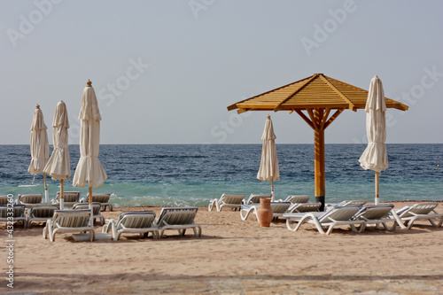 beach chairs and umbrellas