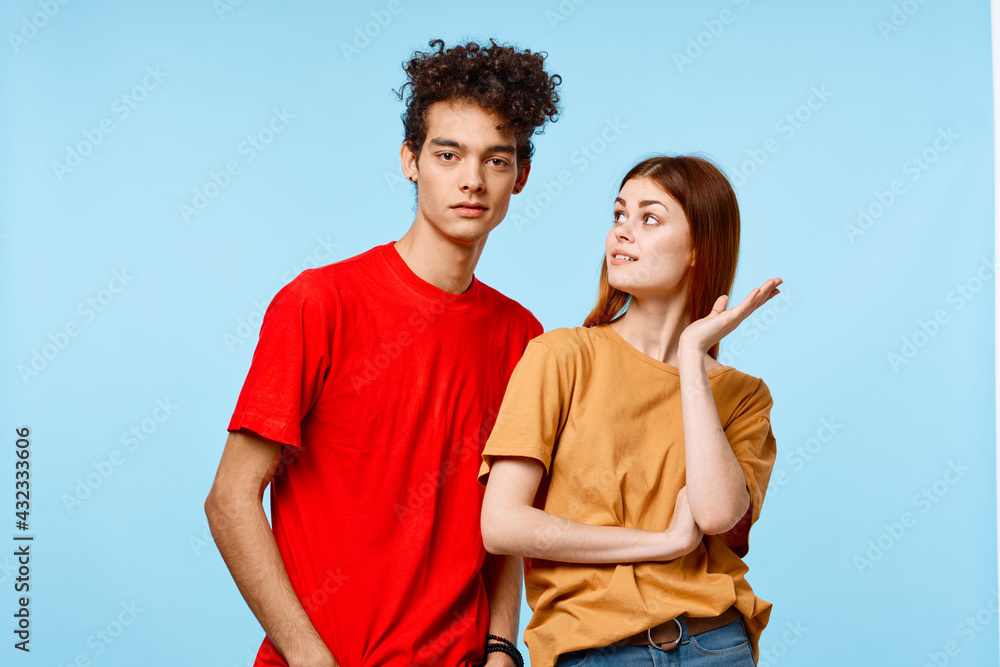 a guy and a girl in colorful t-shirts more fun studio modern style a guy and a girl in colorful t-shirts more fun studio modern style