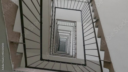 Winder square staircase stairs looking up down tall deep apartment house building old vintage soviet Berlin 4K