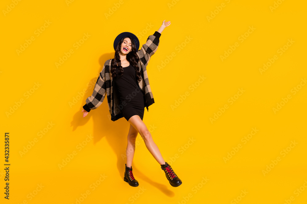 Photo of inspired lady dance enjoy wear hat checkered coat mini dress footwear isolated yellow color background