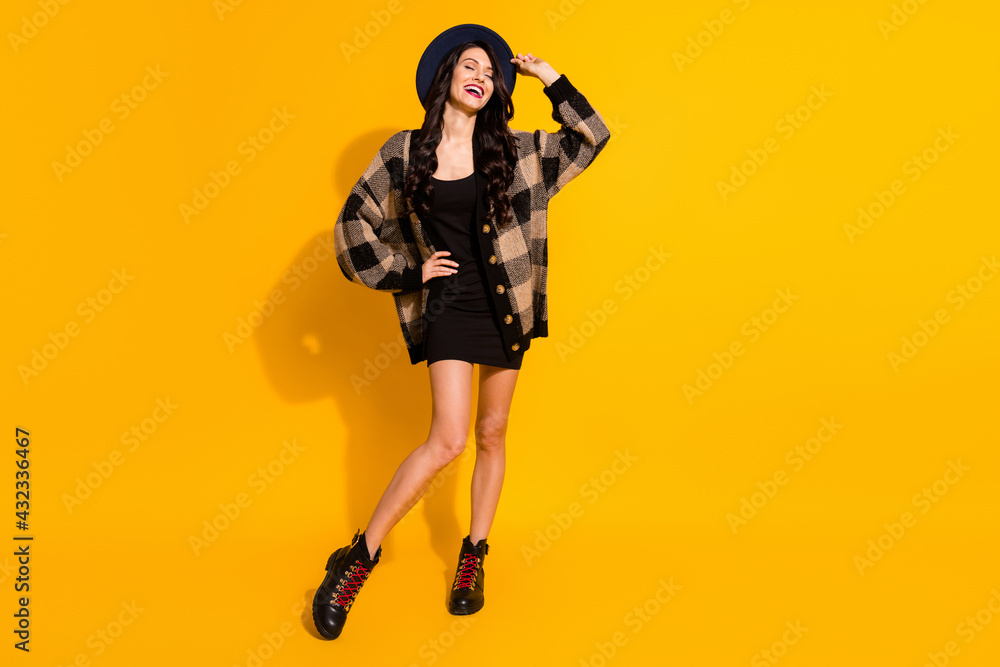 Full body photo of cheerful positive young pretty lady closed eyes enjoy free time isolated on yellow color background Full body photo of cheerful positive young pretty lady closed eyes enjoy free time isolated on yellow color background