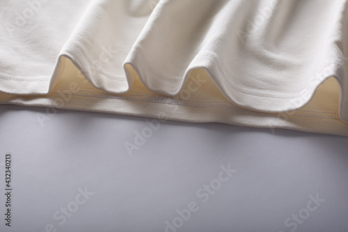 texture clothing waves. White fabric texture background.