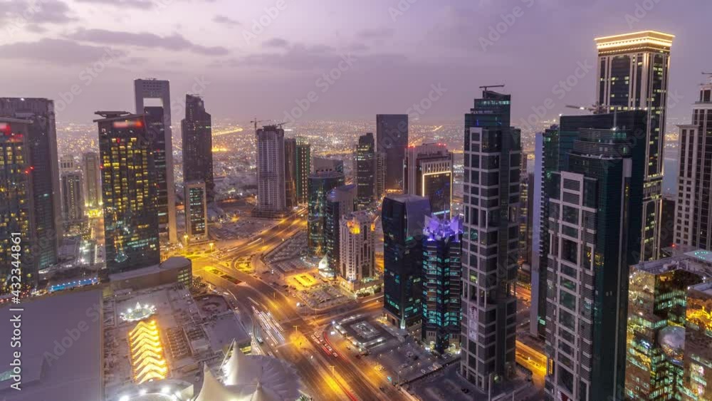 The skyline of the West Bay area from top in Doha day to night timelapse, Qatar. The skyline of the West Bay area from top in Doha day to night timelapse, Qatar.