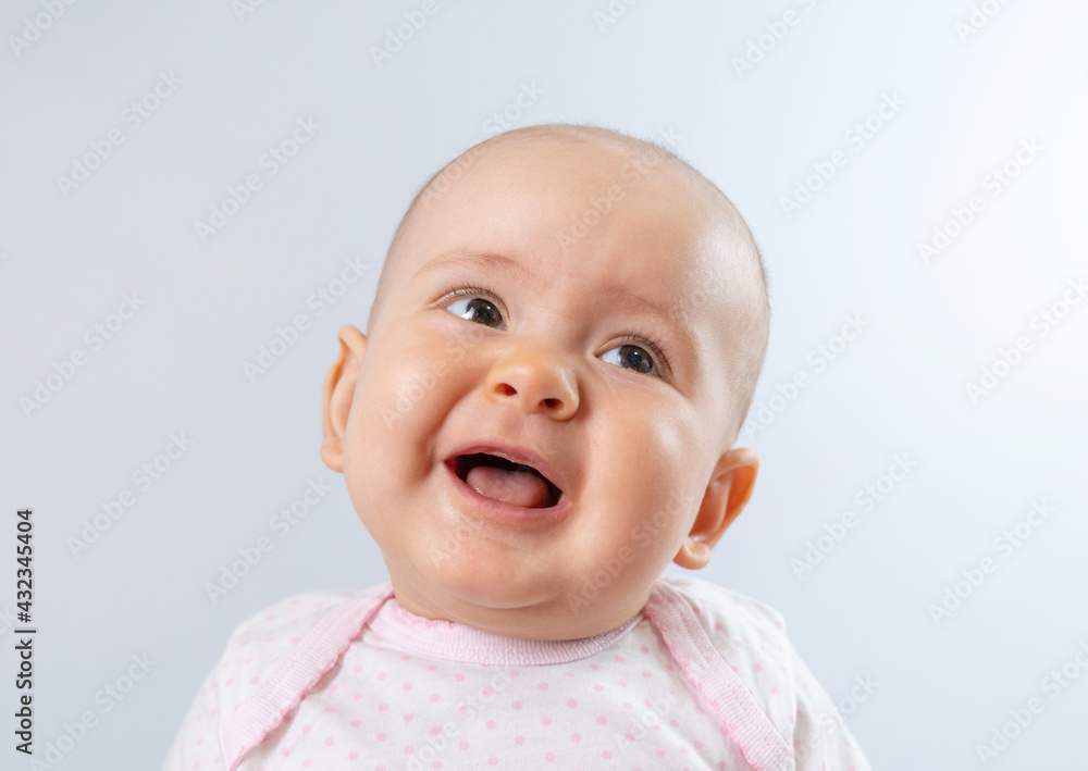 Portrait of a happy newborn baby 8-10 months