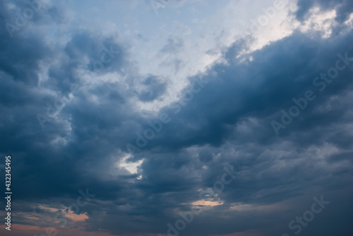 Beautiful storm clouds against the backdrop of sunset skies.