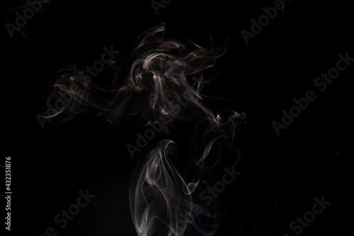 Fototapeta Naklejka Na Ścianę i Meble -  cloud of white smoke on black background