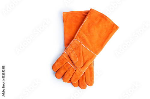 Фотография Coarse leather gloves on a white background,Good protection from heat, fire, cuts and scratch