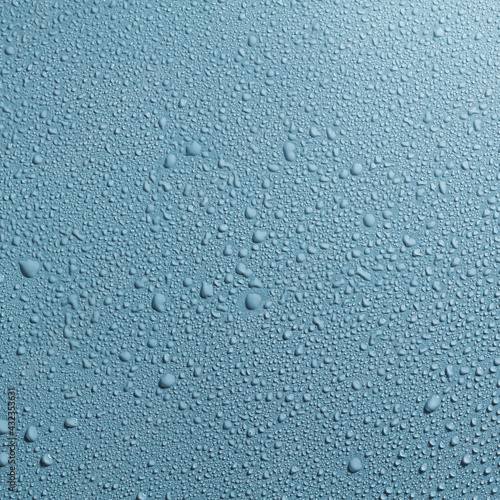Water drops on a gray surface, a beautiful pattern of water splashes on the background
