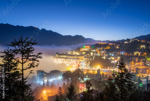 View of Sapa city in the blue hour, famous travel destination in Vietnam. City background