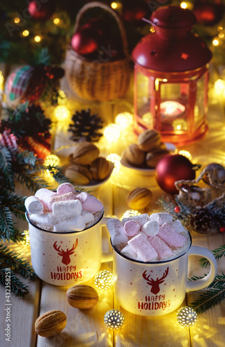 Festive Christmas table. Cups of hot chocolate with sweet nuts