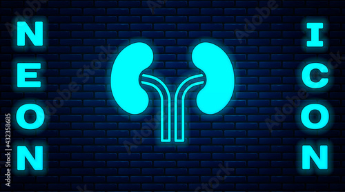 Glowing neon Human kidneys icon isolated on brick wall background. Vector