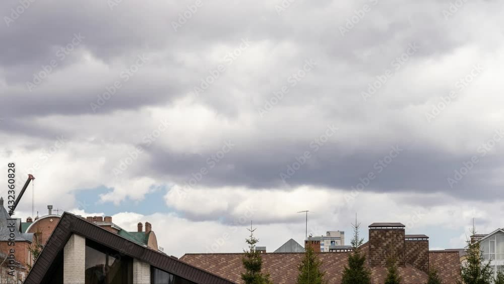The movement of white and gray cumulus clouds over the rooftops of houses
in the city like Time Lapse.
The movement of white and gray cumulus clouds over the rooftops of houses
in the city like Time Lapse.