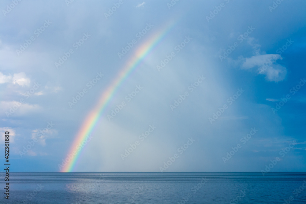 Rainbow over Lake Baikal. Horizontal image. Rainbow over Lake Baikal. Horizontal image.