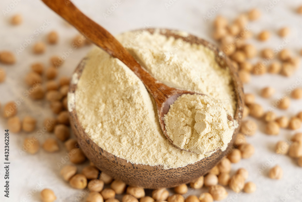 Bowl of raw chickpea flour and beans Bowl of raw chickpea flour and beans