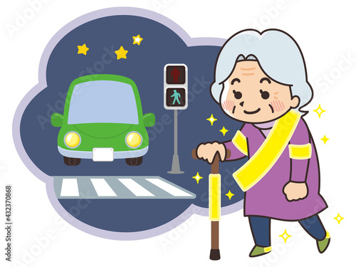 反射板を付けて歩く高齢者　夜の交差点　交通安全