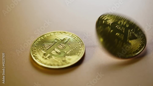 spinning bitcoin on wooden table top