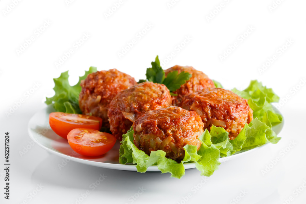 Meat balls in tomato sauce isolated on a white background. Meat balls in tomato sauce isolated on a white background.