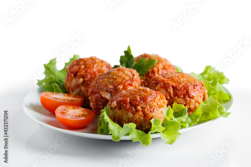 Meat balls in tomato sauce isolated on a white background.