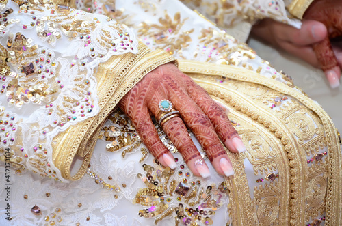 A moroccan wedding couple hands... photo
