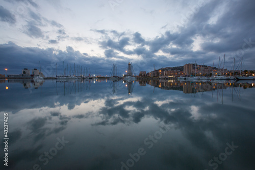 Sicilian harbour scenery in the evening   