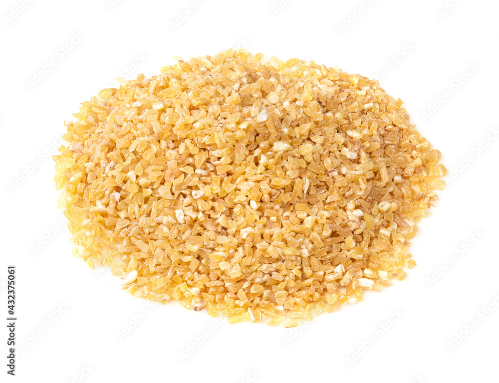 handful of raw wheat groats closeup on white handful of raw wheat groats closeup on white