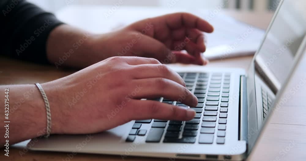 Hands of businessman typing on laptop at office Hands of businessman typing on laptop at office