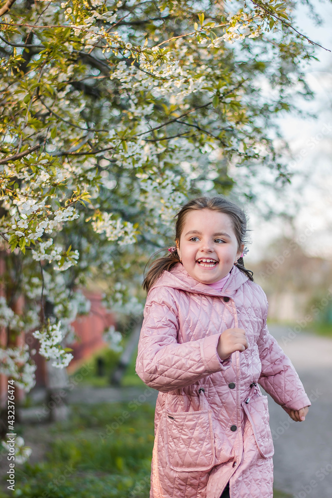 little girl in spring park