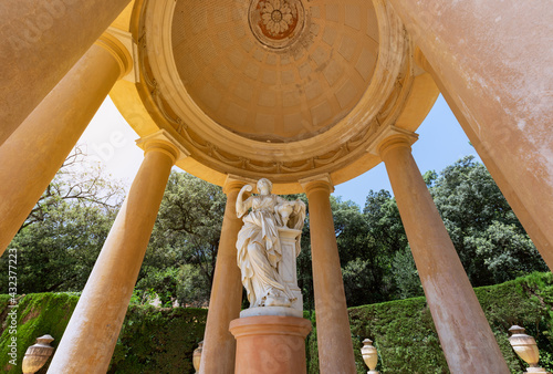 Pavilion with sculpture in in Park of the Labyrinth of Horta (Parc del Laberint d'Horta) in Barcelona, Spain photo