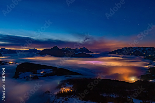 sunset in the mountains with fog