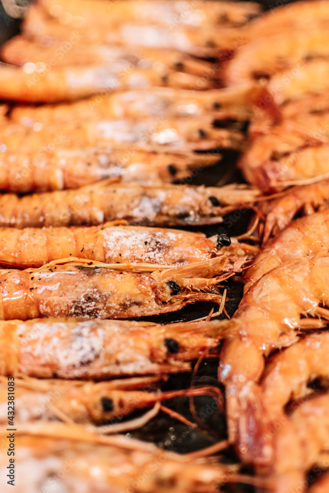 Set of cooked prawns on a baking tray Set of cooked prawns on a baking tray
