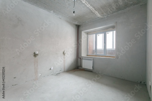 interior of the apartment without decoration in gray colors