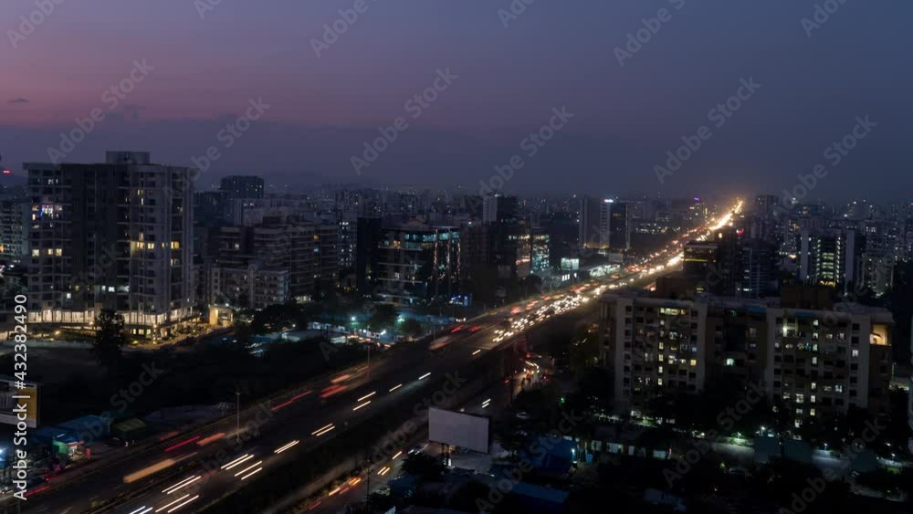Aerial Time Lapse of Busy Traffic over the Mumbai-Pune-Bengaluru National Highway, Pune City, Maharashtra, India Aerial Time Lapse of Busy Traffic over the Mumbai-Pune-Bengaluru National Highway, Pune City, Maharashtra, India