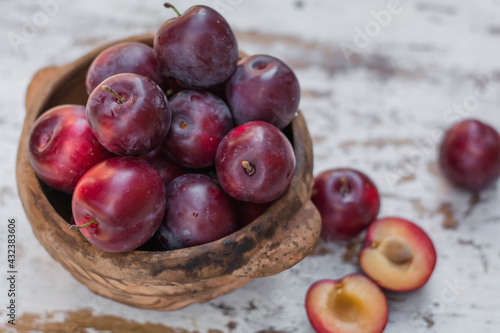 ripe plums on the table © Юлія Дерід